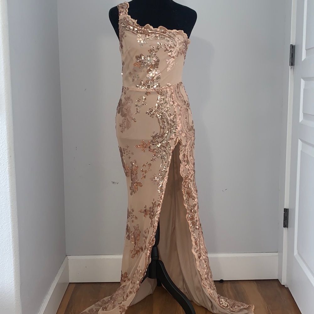 XS, floor length prom dress by stunner boutique in the color pink/nude